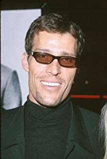 How tall is Tony Robbins?